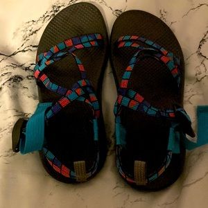 Blue,teal,and pink chacos
